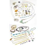 Assorted costume jewellery to include bracelets necklaces etc together with Pandora style charm