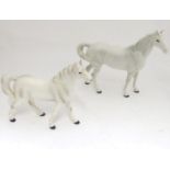 A white Beswick horse, together with model of a white. (2) Please Note - we do not make reference to