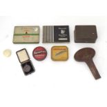 A quantity of items to include an assortment of early 20thC cigarette tins, a bronze medal for