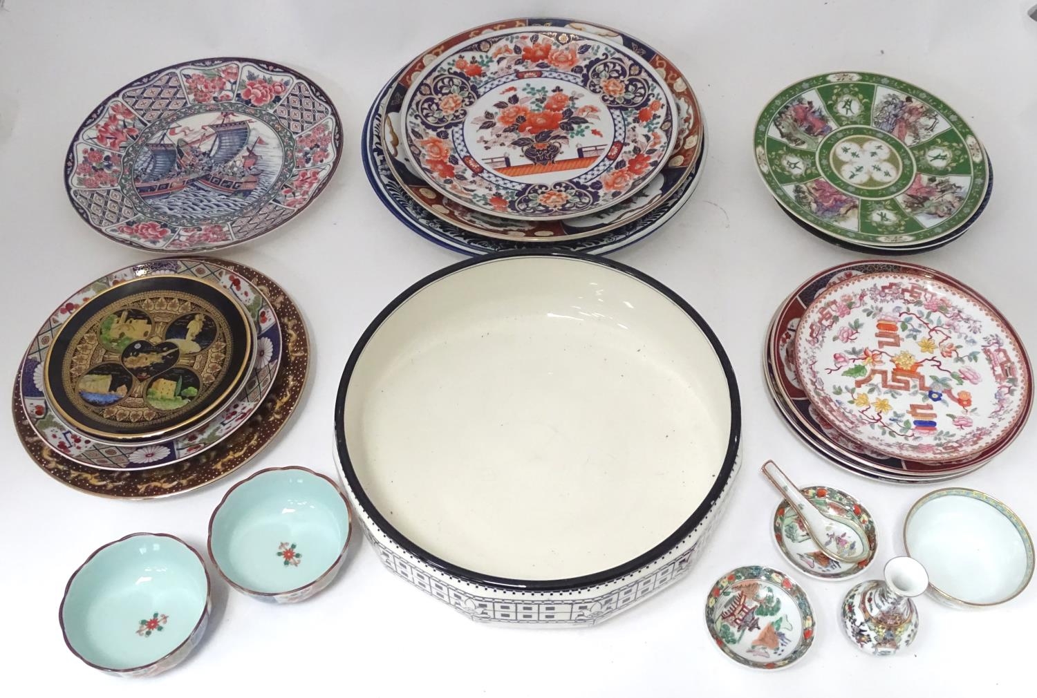 A quantity of assorted ceramics to include chargers, large wash bowl, Oriental bowls, vase, etc.