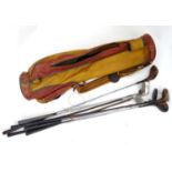 A quantity of vintage golf clubs and bag Please Note - we do not make reference to the condition