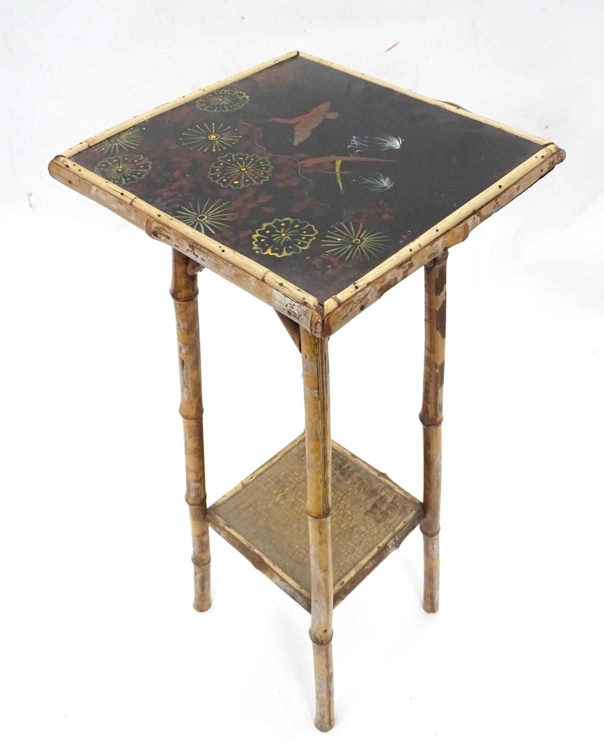 A chinoiserie jardiniere stand Please Note - we do not make reference to the condition of lots