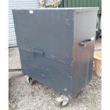 A large outdoor storage container marked OX 3126 Please Note - we do not make reference to the