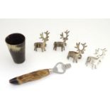 A horn beaker, together with four napkin rings with stag head detail and a bottle opener with deer