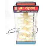 A Zippo lighter shop display unit Please Note - we do not make reference to the condition of lots