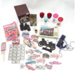 A box of miscellaneous to include novelty phone, drinking glasses, wine glasses, binoculars etc.