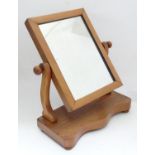 An early 20thC mahogany toilet mirror Please Note - we do not make reference to the condition of