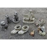 A quantity of garden ornaments to comprising 3 dogs, a tortoise, 2 boots, an old man and a bench and