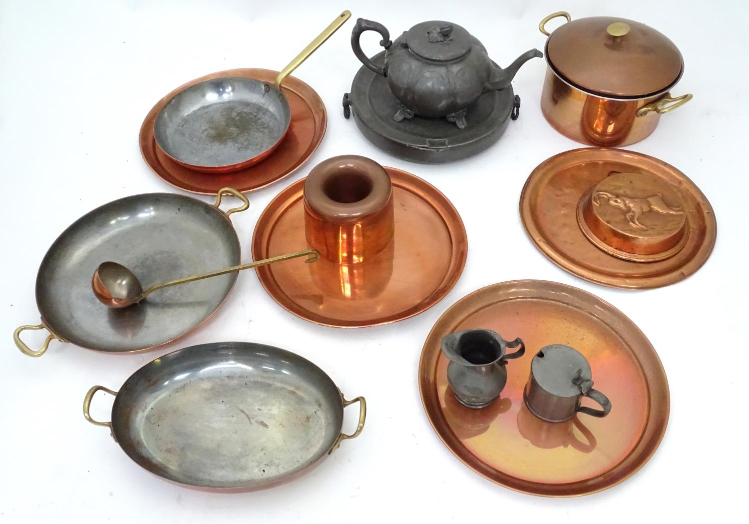 A quantity of assorted metal ware to include copper pans, a pewter warmer, teapot etc. Please Note -