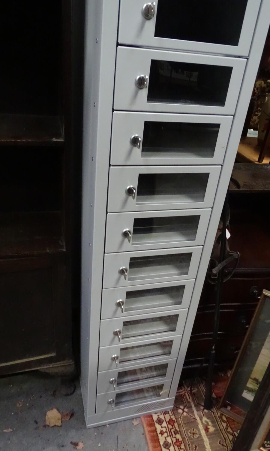 A late 20th / early 21stC metal cabinet by EFG containing 16 separate locking sections Please Note - - Image 5 of 6