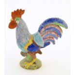 A model of a cockerel / rooster with hand painted detail. Approx. 6 1/2" high Please Note - we do
