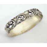 Scandinavian silver : A Norwegian silver D-shaped napkin ring with acanthus scroll detail. Bearing