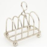 A silver 5 bar toast rack hallmarked Sheffield 1931 maker Goldsmiths & Silversmiths Co Ltd/ 4 1/2"