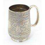 A Victorian silver christening mug with banded geometric, floral motif, acanthus scroll and bird