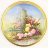 A 19thC roundel in the manner of Derby with hand painted decoration depicting an Italian landscape