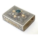 A .925 silver matchbox holder / cover with gilt detail and set with green stone cabochon to