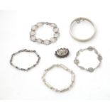 Assorted silver and white metal jewellery to include bracelets, brooch, etc. Please Note - we do not