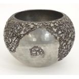 A 20thC Scandinavian / Norwegian pewter bowl with hammered and relief decoration by Martin T.