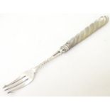 A Victorian silver pickle fork with a mother of pearl twist handle, hallmarked Sheffield 1862, maker