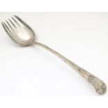 A large silver serving fork with 6 tines, hallmarked London 1802, maker William Eley & William