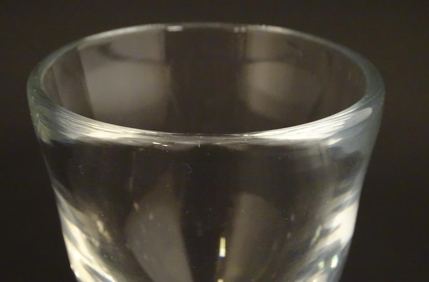 A drinking glass with wide foot. 4 1/2" high Please Note - we do not make reference to the condition - Image 4 of 5