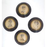 A set of four French 19thC portrait miniature frames of circular form with convex glass and tole