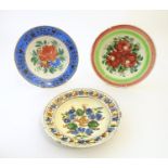 Three 19thC earthenware dishes with floral and foliate decoration. Largest approx. 9 1/4"