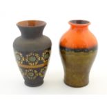 Two West German vases, one with banded floral motifs, marked under Germany 150 20, the other