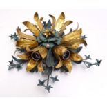 A late 20thC ceiling light, formed as a rosette of lily and harebells, constructed from pressed