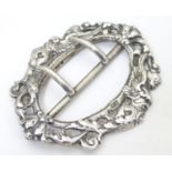 A Victorian silver buckle with cast scroll and caryatid detail, hallmarked Birmingham 1900, maker