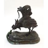 A 20thC Continental cast bronze model as a cockerel and lizard, from Aesop's Fables, cast