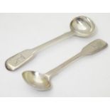 A pair of George IV silver fiddle pattern salt spoons, hallmarked London 1827, maker James Beebe.