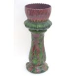 A large Victorian majolica jardiniere on stand of stylised flower form. Approx. 38 1/4" high