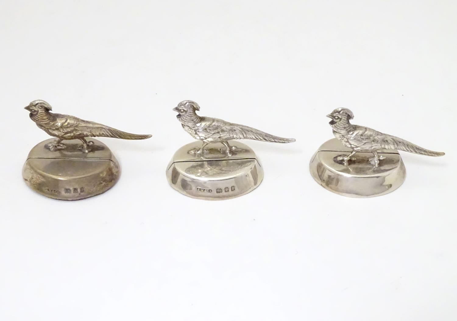 Three silver table place card / menu holders formed as pheasants. Hallmarked London 1930 maker