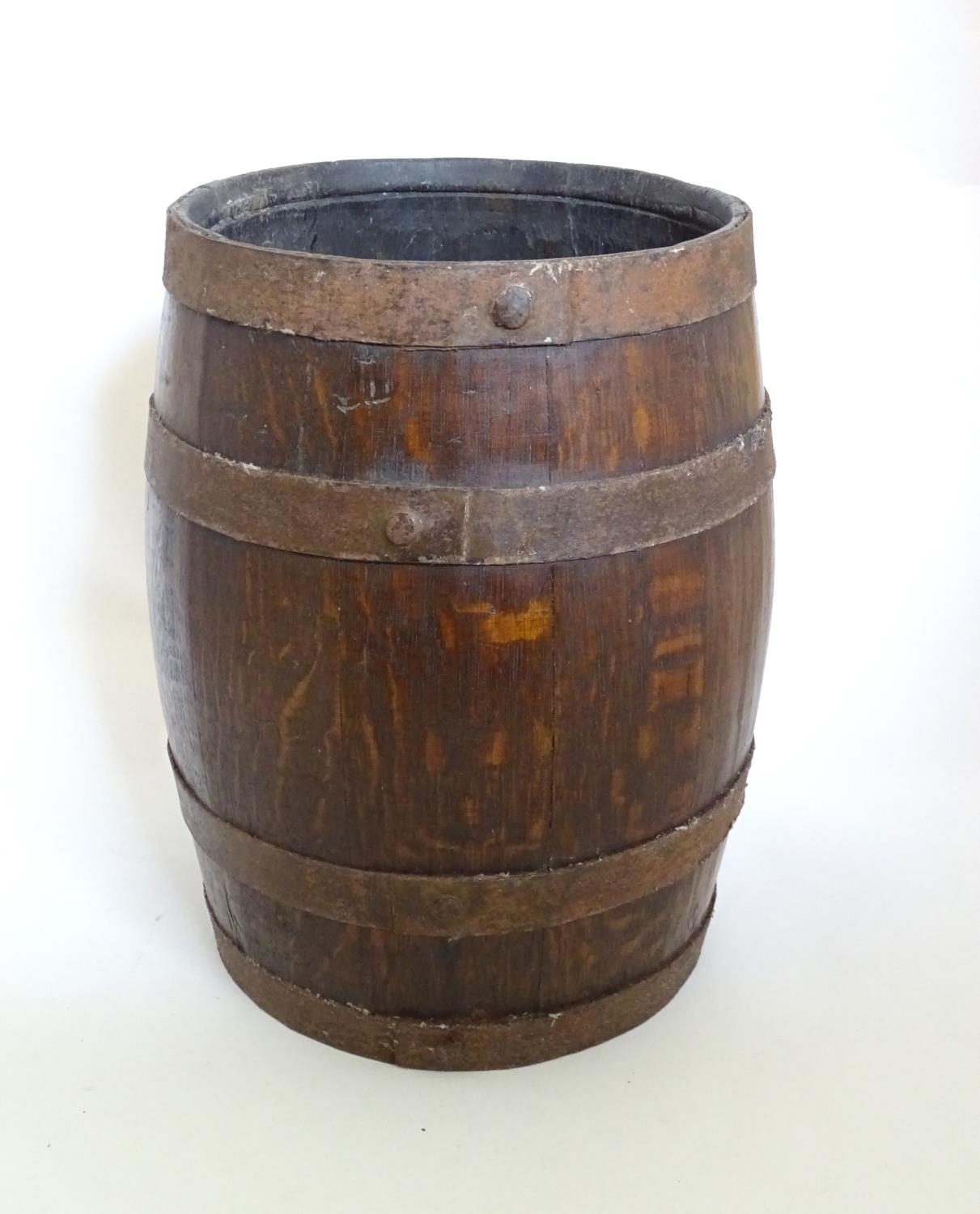 A 20thC coopered oak basket converted from a pin ale barrel, 12 1/2'' tall Please Note - we do not - Image 2 of 12