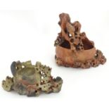Two Oriental carved soapstone brush washer pots, decorated with carved birds and foliage. The