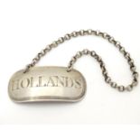 A Geo III silver wine label / decanter label / bottle ticket engraved ' Hollands ' Hallmarked London