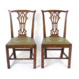 A pair of late 18thc / early 19thC mahogany Chippendale style side chairs with a pierced splat, drop