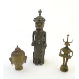 Three assorted cast figures comprising an African Benin style seated figure, a model of the head