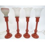 Four 20thC table lamps of red tole peinte style form and glass shades. Approx. 19" tall (4) Please