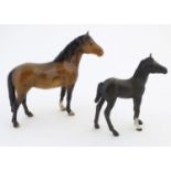 Two Beswick horses comprising New Forest Pony, model no. 1646 and Black Beauty Foal, model no.