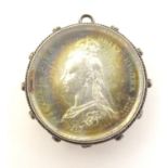 A Victorian coin in captive pendant mount. 1" diameter Please Note - we do not make reference to the