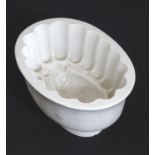 A Victorian Copeland white stoneware jelly mould, the interior with pineapple, impressed with