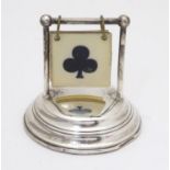 A silver trump card marker, hallmarked London 1922, maker Henry Perkins & Sons. Approx. 2" high