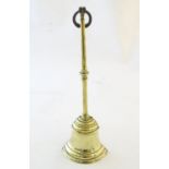 A late 19thC brass doorstop / door porter. Approx. 15 1/4" high Please Note - we do not make