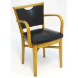 Vintage retro, mid century: a beech desk chair, the splat and seat with black vinyl covering, with