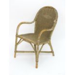 An early 20thC Dryad childs chair of wicker and bentwood construction. 15" wide x 16" deep x 25"