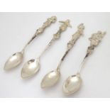A set of four Continental teaspoons the handles surmounted by various figures / musicians in 19thC
