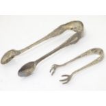 Silver sugar tongs, one hallmarked Birmingham 1899, maker Robert Pringle, the other Birmingham 1924,