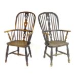 Two mid 19thC ash and elm double bow back Windsor armchairs, having central pierced back splats